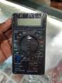 DT830B digital multimeter.