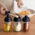 Kitchen Seasoning Bottle Set Household Sealed Moisture Proof Spoon Cover Integrated Glass Seasoning Jar.