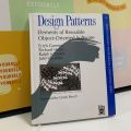 Design Patterns: Elements of Reusable Object-Oriented Software  by Erich Gamma , Richard Helm , Ralph Johnson , John Vlissides , Grady Booch (Foreword) , First Edition. 