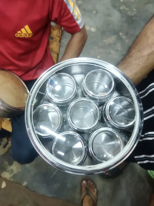 Premium%207%20Pcs%20Stainless%20Steel%20Spice%20Jar%20Set%20with%20Rotating%20Carousel%20Stand,%20Durable%20SS%20Kitchen%20Spice%20Rack%20with%20Glass%20Lids,%20Ideal%20for%20Organizing%20Spices,%20Herbs,%20and%20Seasonings%20in%20Your%20Modern%20Pantry%20System.%20-%20Image%203
