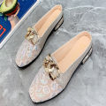 Summer new Korean version of low-heeled head metal buckle sandals half slip shoes female fashion transparent mesh half slippers. 