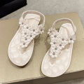 Cross border women's shoes foreign trade plus size bohemian herringbone sandals women's shoes summer new clip-toe flower flat shoes.