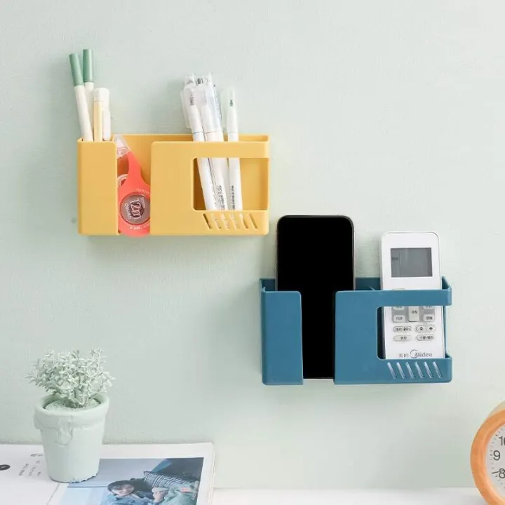 Multi-functional%20Wall%20Holder%20with%20extra%20Storage%20Box,%20Remote%20Control%20holder,%20Mobile%20stand%20Charging%20Shelf%20-%20Phone%20Stand%20-%20Image%202
