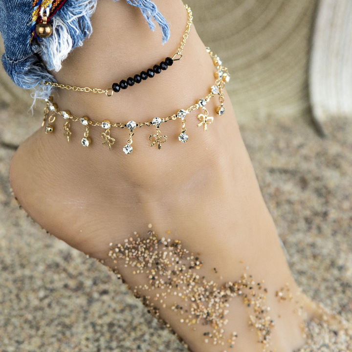 Cross-border hot selling foot ornaments European and American simple black crystal beads rhinestone bow 2-piece set double beach anklet women