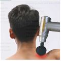 Powerful Handheld Massage Gun for Deep Tissue Relief - Compact & Elegant Design.