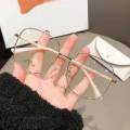 2023 New Eyeglasses: Popular European and American Women's Anti Blue Light Glasses Alloy Frame with Plain Face Fashion Matching Flat Light Glasses.