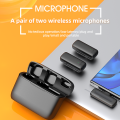 J13 Portable Noise-Canceling Lapel Mic Wireless Dual Microphone With Charging Case For content creators to make live audio videos support android, iphone and windows. 