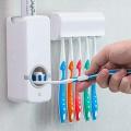 Toothpaste Dispenser Plus Toothbrush Holder. 