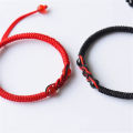 charm detail Ethnic bracelet Stylish Adjustable size Handmade rope material Woven amulet bracelet Ethnic design Woven craftsmanship Adjustable bracelet for wear Yoga and meditation Ethnic fashion. 