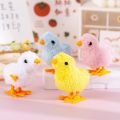 Adorable Soft Plush Wind-Up Baby Bird Toy with Moving Beak and Legs.