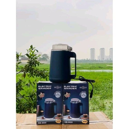 Mini%20Electric%20Coffee%20Beans%20Chopper%20%E2%80%93%20Superfine%20Powder%20Grinding%20Machine%20for%20Spices,%20Grains,%20and%20Beans%20%E2%80%93%20Efficient%20Kitchen%20Grinder%20Blender%20Tool%E2%80%93NM-8700/NM-8800%20(600%20watt/650%20watt)%20-%20Image%204