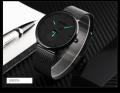 SKMEI 9185 Black Mesh Stainless Steel Analog Watch For Men - Green & Black. 