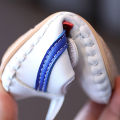 Baby soft soled walking 0-2 year old male female children's shoes, baby spring and autumn leather, small white shoes that won't fall off.
