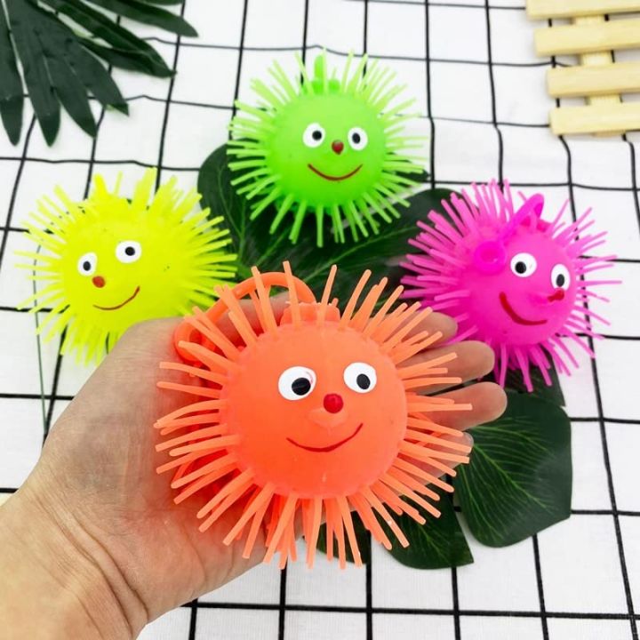 Smile%20Face%20Puffer%20Ball%20with%20Flashing%20Light%20Stress%20Relief%20Squeeze%20Ball%20Fun%20Toy%20for%20Children%20and%20Adults%20(Random%20Color)%20Pack%20of%201%20-%20Image%206