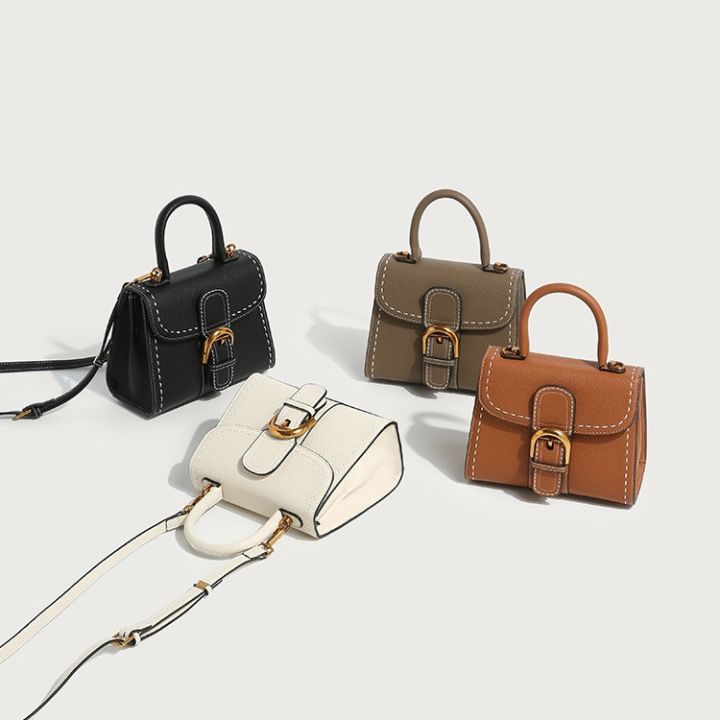 The new Delvo horseshoe buckle wax thread versatile one-shoulder crossbody saddle bag retro Kelly women's bag has a sense of luxury and simplicity