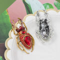 Punk style four-color diamond-encrusted beetle insect brooch men's personality creative blazer with accessories pins. 