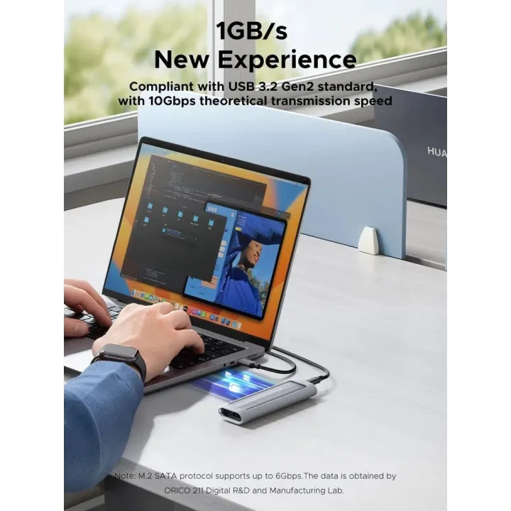 ORICO%20AXM2S-G2%20M.2%20NVMe%20&%20M.2%20NGFF/M.2%20SATA%20SSD%20Enclosure%20With%20Silicone%20Protective%20Case%20USB-C%20up%20to%2010%20Gbps,%202-in-1%20Cable%20Portable%20Hanging%20Rope%20-%20Image%202