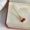 Fashion Red Cherry Necklace Sweet Ruby Summer Chic Rhinestone Cubic Zirconia Gold Pendant Necklace Clavicle Chain for Women Girls Boho Wedding Jewelry Gifts.