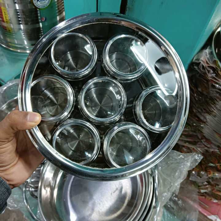 7%20Pcs%20Stainless%20Steel%20Spice%20Jar%20Set%20with%20Rotating%20Carousel%20Stand,%20Premium%20SS%20Kitchen%20Spice%20Rack%20with%20Glass%20Lids,%20Durable%20Space-Saving%20Organizer%20for%20Herbs%20and%20Spices%20in%20Every%20Sophisticated%20Modern%20Home%20Pantry.%20-%20Image%204