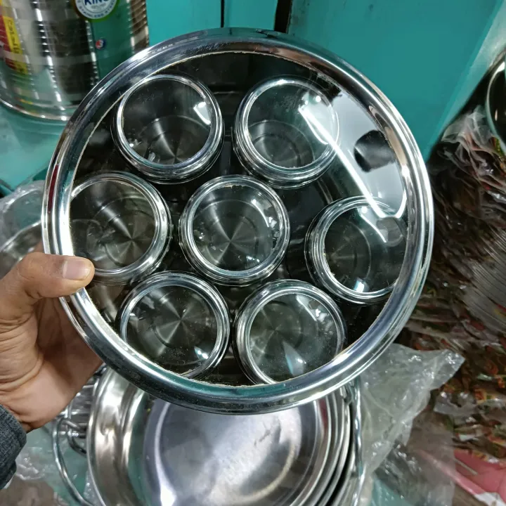 Premium%207%20Pcs%20Stainless%20Steel%20Spice%20Jar%20Set%20with%20Rotating%20Carousel%20Stand,%20Durable%20SS%20Kitchen%20Spice%20Rack%20with%20Glass%20Lids,%20Ideal%20for%20Organizing%20Spices,%20Herbs,%20and%20Seasonings%20in%20Your%20Modern%20Pantry%20System.%20-%20Image%204