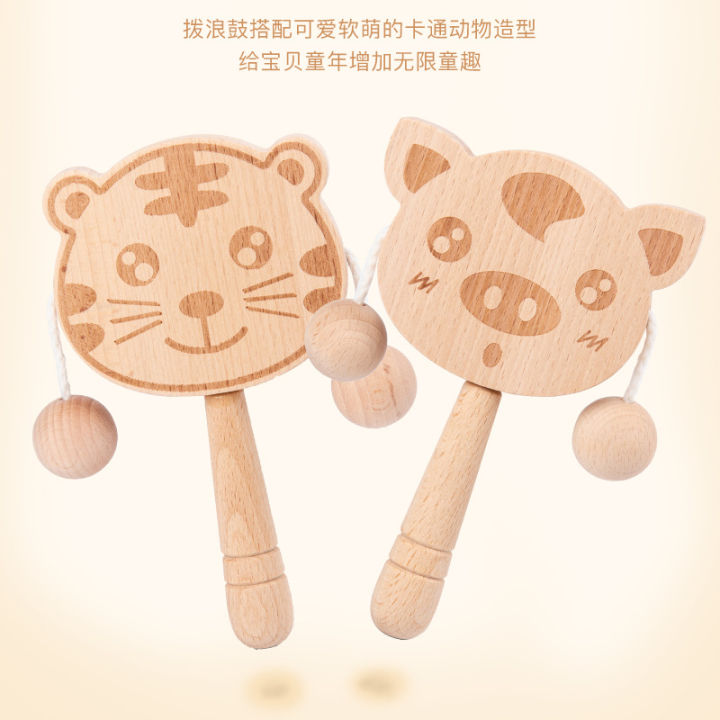 Wooden%20cartoon%20tambourine%20toy,%20newborn%20baby%20can%20chew%20and%20shake%20drum,%20traditional%20children's%20early%20education%20hand%20ringing%20the%20bell%20-%20Image%204