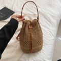 Eco-Friendly Bamboo Handle Straw Bag Chic Natural Lightweight Handmade Bamboo Woven Handbag Sustainable Handcrafted Handmade Straw Woven Beach Bag for Beach Vacations Summer Outings Casual Gatherings. 