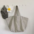 Canvas bag women's ins one-shoulder, large-capacity, lazy wind, striped fashion, big bag, casual literary hand-tote bag women.