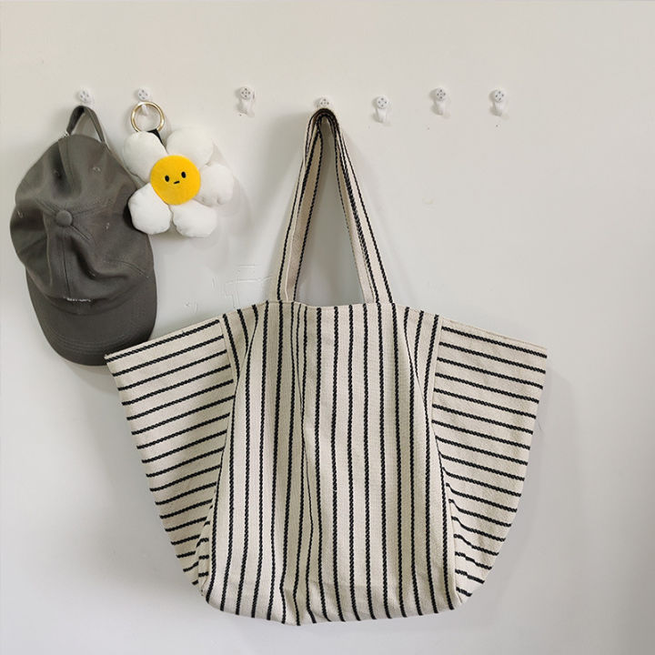 Canvas bag women's ins one-shoulder, large-capacity, lazy wind, striped fashion, big bag, casual literary hand-tote bag women