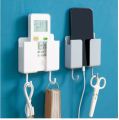 Wall-mounted mobile phone remote control storage box plug charging wall bracket with household hook organize accessories.