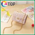Autumn and winter Korean version of the diamond jelly lock pearl bag shoulder diagonal portable female. 