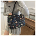 Large capacity one-shoulder handbag  new niche ins canvas bag lazy style tote class commuter bag. 