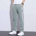 Summer Thin Ice Silk Pants Men's Summer New Korean Style Trendy Sports Casual Pants Straight Loose Long Pants. 