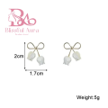 White Color Bowknot Tulip Flower Stud Earrings For Women. 