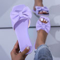 Cross-border 2020 new European and American summer square toe flat bottom straight bow solid color bow women's sandals in stock.