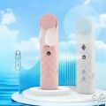 Humidifier Portable and fashionable Rechargeable Handheld Fan.