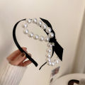 Korea Dongdaemun pearl headband French court vintage celebrity simple headband temperament fashion hair accessories female wholesale.