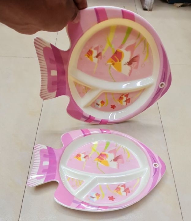 This colorful Fish Plate Makes Mealtime a fin-tactic Adventure! Divided sections keep portions playful, while the non-slip base helps prevent spills. Made from safe, durable materials, it's perfect for tiny hands and growing appetites
