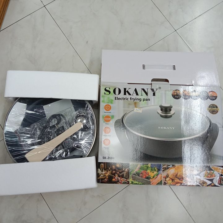1pc%20Sokany%20Electric%20Skillet/boiling%20Pan%20Sk-2004,%201500w%20High%20Power,%20Quick%20Boiling,%20Strong%20Firepower,%20Easy%20Operations,%20Easy%20To%20Clean,%20Multifunctional,%20Transparent%20Cover,%20Non-stick%20Pan%20Design,%20Heat-resistant%20Handle%20-%20Image%202