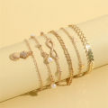 European and American stacking style fashion imitation pearl set anklets beach style star tassel pineapple pendant anklets 5 pieces. 