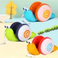 【The road to happiness Store】NEW Pull String Cartoon Snail toy Baby Learn Crawl and Pull Toy with Light and Music Early Education Toys for Gi. 