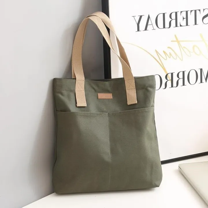 TAG%20Lifestyle%20Canvas%20Tote%20Bag/Fashionable%20Top%20Handle%20Olive%20Green%20Color%20With%202%20Big%20Outside%20Pocket%20and%20Zipper%20Enclosure%20for%20girls%20For%20University/College/Trendy%20Fashionable%20Women%20-%20Image%203