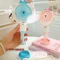 Stylish Cute Rechargeable Hand Fan With Mobile Stand & Spray For Indoor & Outdoor Use - Multicolor. 