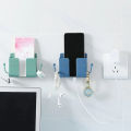Mobile Phone Charging Hanging Holder Multifunction Wall Mounted Plug Bracket Remote Control Mounted Storage Box.