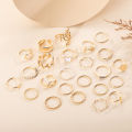 24Pcs Elegant Gold Metal Butterfly Leaf Love Hollow Twist Open Ring Set Pearl for Women Accessories  Wholesale. 