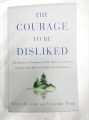 The Courage to Be Disliked book by Fumitake Koga and Ichiro Kishimi. 