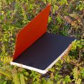 Daily Journal Orange Notebook with Elastic Band. 