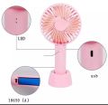 Portable mini rechargeable travel fan for indoor and outdoor use. 