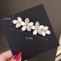 Nieuwe Koreaanse Oog Witte Kat Zirkoon Lente Haar Clip Parel Strik Boutique Legering Top Clip Elegante Vrouwen Mode haar Sieraden. 