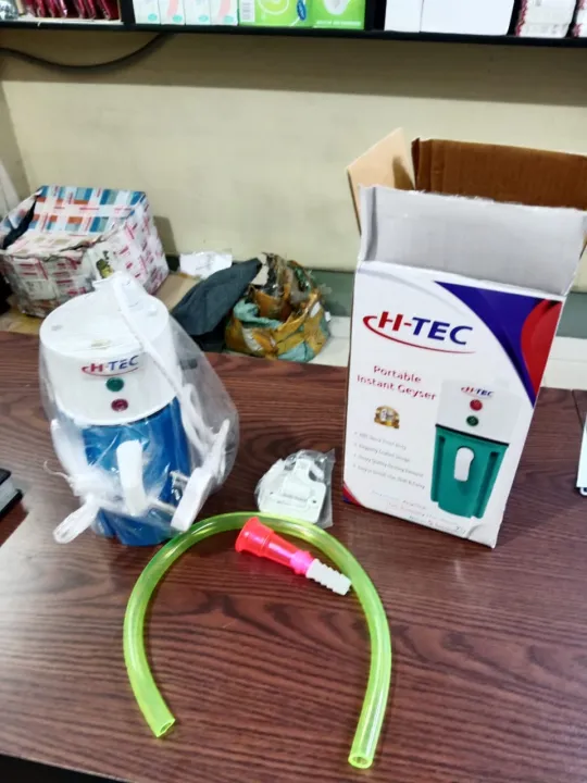 H-TEC%20Portable%20Instant%20Water%20Heater%20geyser%20premium%20quality%20machine%20with%201%20year%20warranty%20(%E0%A6%AA%E0%A7%8B%E0%A6%B0%E0%A7%8D%E0%A6%9F%E0%A7%87%E0%A6%AC%E0%A6%B2%20%E0%A6%97%E0%A6%BF%E0%A6%9C%E0%A6%BE%E0%A6%B0%205%20%E0%A6%B8%E0%A7%87%E0%A6%95%E0%A7%87%E0%A6%A8%E0%A7%8D%E0%A6%A1%E0%A7%87%20%E0%A6%97%E0%A6%B0%E0%A6%AE%20%E0%A6%AA%E0%A6%BE%E0%A6%A8%E0%A6%BF)%20-%20Image%204