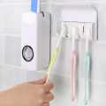 Automatic Toothpaste Dispenser with Toothbrush Holder. 